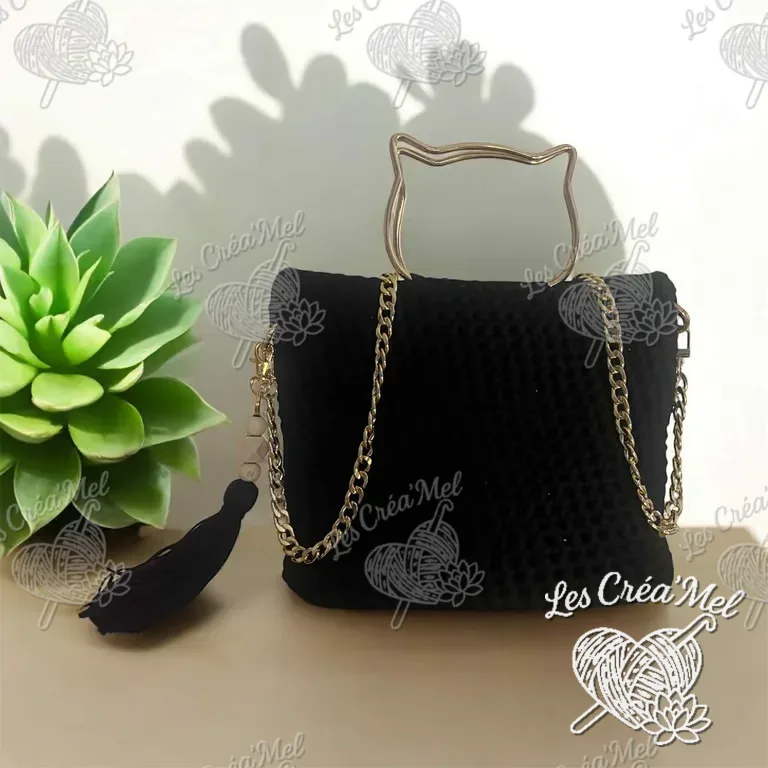 Sac à main noir avec poignée chat — photo 1 sur 2